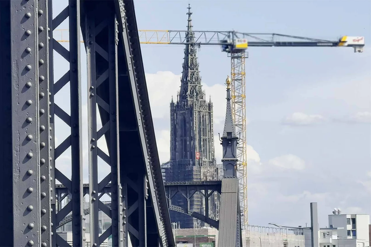 Behind the construction fence